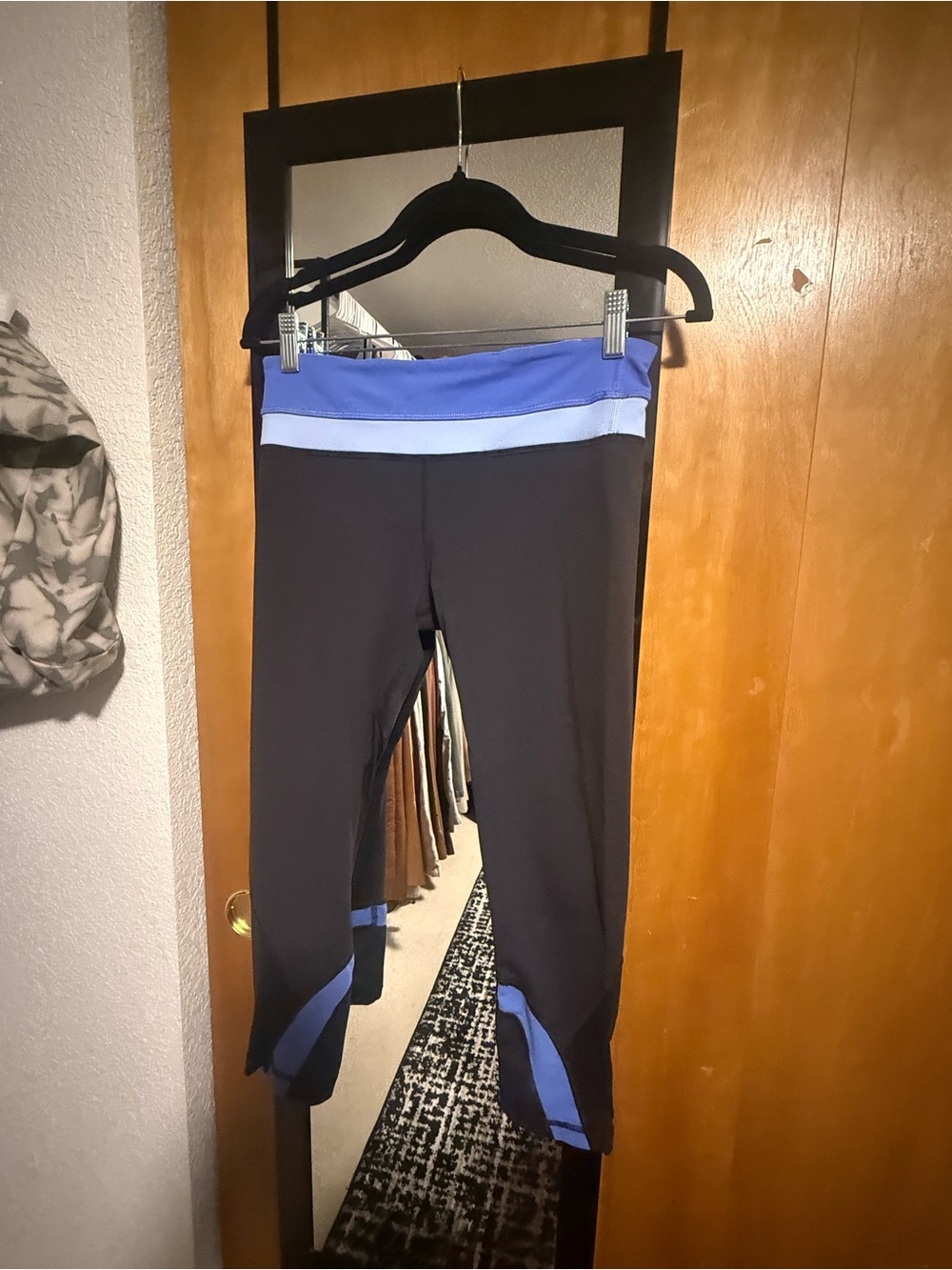 Woman’s lululemon Black and Blue Athletic Crop Leggings